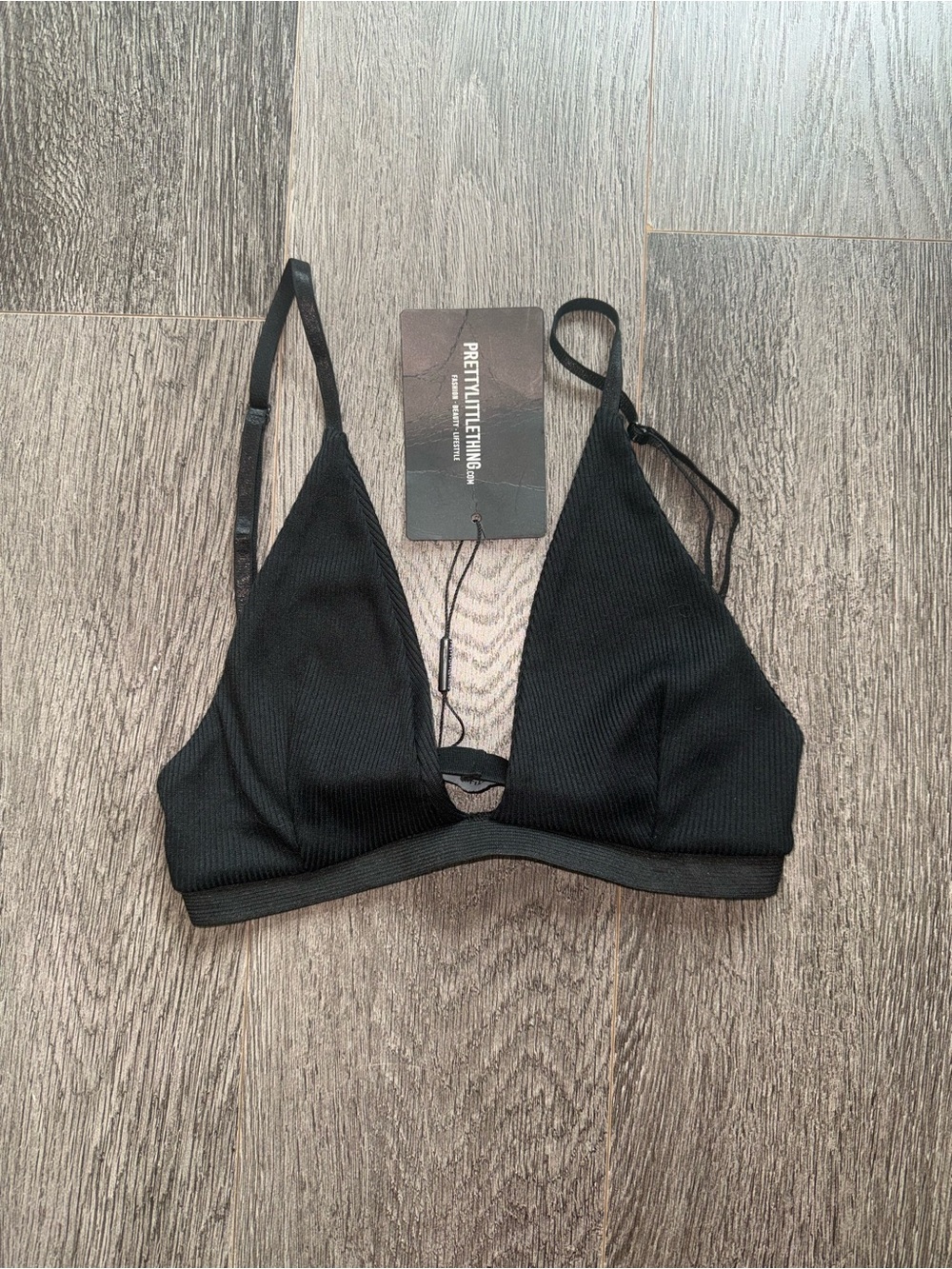 PrettyLittleThing Black Ribbed Triangle Bralette with Cut-Out